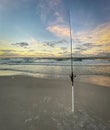 Fishing pole in Sand. Shore fishing.