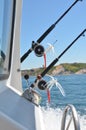 Fishing poles, reels and lures on a charter fishing boat. Royalty Free Stock Photo