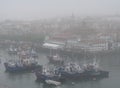 The fishing port of Bermeo under the fog