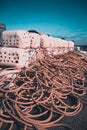 Fishing pots or traps stacked on a dock or quay Royalty Free Stock Photo