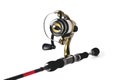 fishing reel on a fishing rod, white background close-up Royalty Free Stock Photo