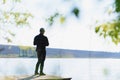 Fishing in river.A fisherman with a fishing rod on the river bank. Man fisherman catches a fish pike.Fishing, spinning reel, fish Royalty Free Stock Photo