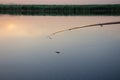 fishing on the river, fishing rod float on the surface of the water Royalty Free Stock Photo