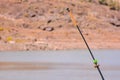 Fishing with rod on lake