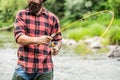 Fishing rod lake fisherman men sport summer. Fisherman with rod fishing on the lake. Fishing. Fisherman and trout. Fly Royalty Free Stock Photo