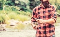 Fishing rod lake fisherman men sport summer. Fisherman with rod fishing on the lake. Fishing. Fisherman and trout. Fly Royalty Free Stock Photo