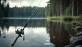 fishing rod reel on the background of the lake. Royalty Free Stock Photo