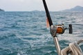 Fishing rod and reel on a boat Royalty Free Stock Photo