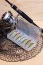 Fishing rod and reel with box for baits. Royalty Free Stock Photo