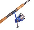 Fishing rod and reel isolated over white Royalty Free Stock Photo