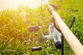 Fishing rod with reel on a stand near the coast with sunlight Royalty Free Stock Photo
