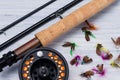 Fishing rod with reel and various baits for fishing close-up