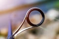 Fishing rod spinning ring with the line close-up. Fishing rod. Rod rings Selective focus and shallow Depth of field .Fishing tackl Royalty Free Stock Photo