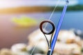 Fishing rod spinning ring with the line close-up. Fishing rod. Rod rings Selective focus and shallow Depth of field .Fishing tackl