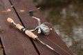 Fishing Rod On Wooden Pier On Pond On Fishing. Royalty Free Stock Photo