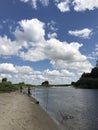 Fishing rods along the river bank. A wonderful river landscape.