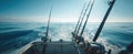The Fishing Rods Bathed in Sunlight Over the Calm Ocean Surface AI generated image Royalty Free Stock Photo