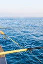 Fishing rods in boat during fishery in sea. Successful fishing concept. copyspace. vertical photo Royalty Free Stock Photo