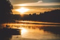 Fishing rods on the bridge in the beautiful view of orange sunrise near the foggy lake Royalty Free Stock Photo