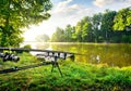 Fishing rods near river Royalty Free Stock Photo