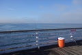 Fishing Rods and Red Cooler at Crystal Pier, Pacific Beach, San Diego, CA Royalty Free Stock Photo