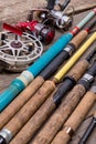 Fishing rods and reels on wooden boards Royalty Free Stock Photo