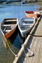 Fishing rowboats tied to dock Royalty Free Stock Photo