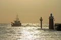 Fishing ship leaving port