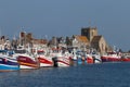 Fishing ships in the Port Barfleur, Normandie on a bright day.