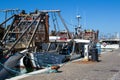 Fishing ships stand at the pier in the seaport Royalty Free Stock Photo