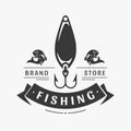 Fishing shops vector logo. Black hook with silhouettes fish on sides symbol of gambling water hunting and long wait