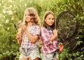 Fishing skills. Summer hobby. Happy smiling children with net and rod. Happy childhood. Adorable girls nature background