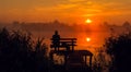 Fishing by the sunrise in the lake. Royalty Free Stock Photo