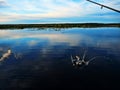 Fishing at sunset Royalty Free Stock Photo