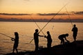 Fishing in the sunset Royalty Free Stock Photo