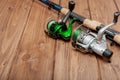 Fishing tackle - fishing spinning, hooks and lures on wooden background with copy space Royalty Free Stock Photo