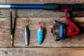 Fishing tackle on a wooden surface Royalty Free Stock Photo