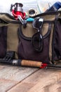 Fishing tackles and lures in open handbag