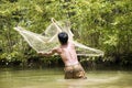 Fishing with a throw net Royalty Free Stock Photo