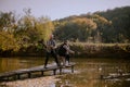 Fishing time for two guy and one cute small boy in the middle of nature beside a perfect lake Royalty Free Stock Photo