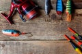 Fishing tackle on a wooden surface Royalty Free Stock Photo