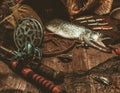 Fishing tools on a wooden table Royalty Free Stock Photo