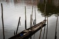 A fishing and transport canoe stops on the riverbank Royalty Free Stock Photo
