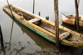 A fishing and transport canoe stops on the riverbank Royalty Free Stock Photo