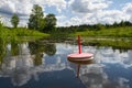 Fishing trap floats on the lake waiting for the bite Royalty Free Stock Photo