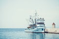 Fishing trawler in the beautiful harbor of a small town Postira - Croatia, island Brac Royalty Free Stock Photo