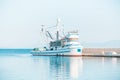 Fishing trawler moored in the beautiful harbor of a small town Postira - Croatia, island Brac Royalty Free Stock Photo