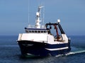 Fishing Trawler Underway in Calm Waters. Royalty Free Stock Photo