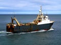 Fishing Trawler Underway at Sea Royalty Free Stock Photo