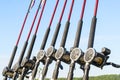 Fishing trolling boat rods in rod holder. Big game fishing. Fishing reels and rods pattern on boat. Sea fishing rods and reels in Royalty Free Stock Photo